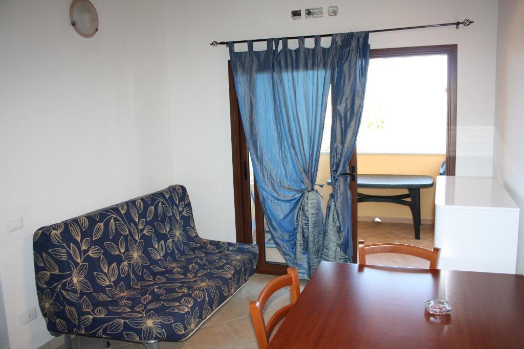 Appartamenti Ideal Isola Rossa Bilik gambar
